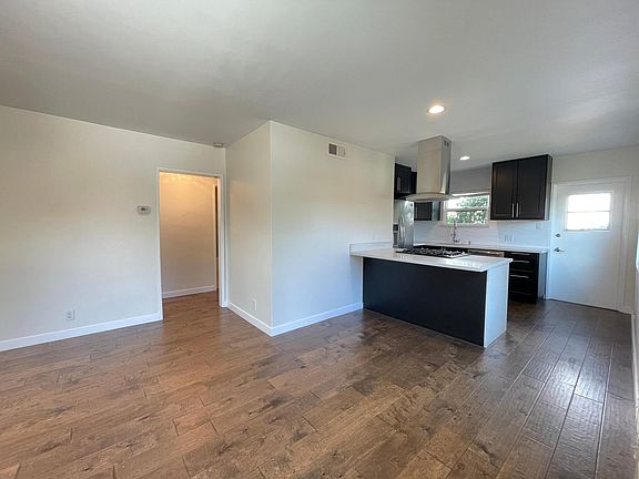 Open plan living/dining & kitchen.