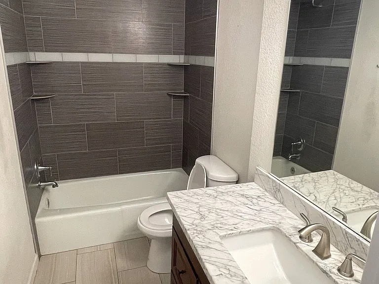 En-suite bathroom connected to Bedroom 1