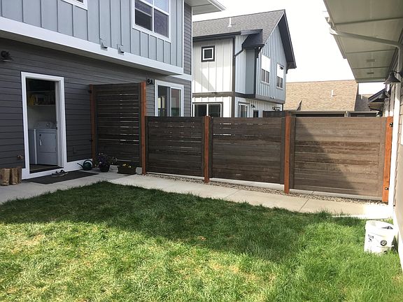 Backyard with fence separating units