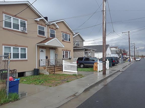 Side Walk View of the House