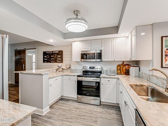 5th image of 4650 Links Village Dr Unit D501