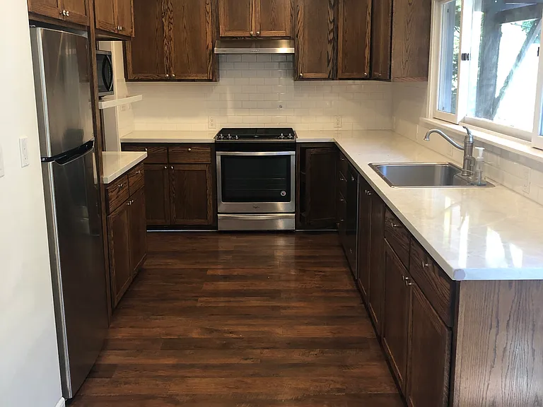 Kitchen- Quartz countertops, stainless appliances