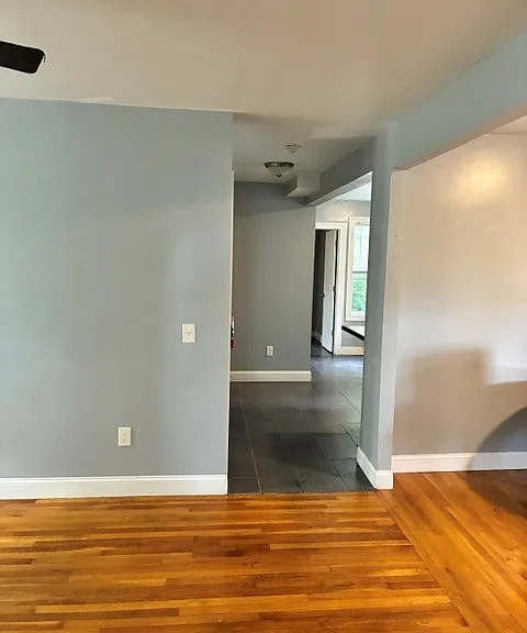 View from 1st bedroom through living room to kitchen.
