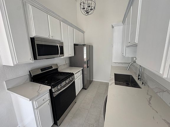 Kitchen with stainless steel appliances