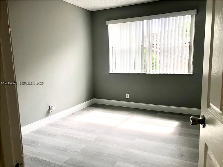 8761 Wiles Rd #306 — Photo 12