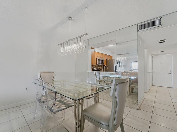 5th image of 6093 POINTE REGAL Circle #209