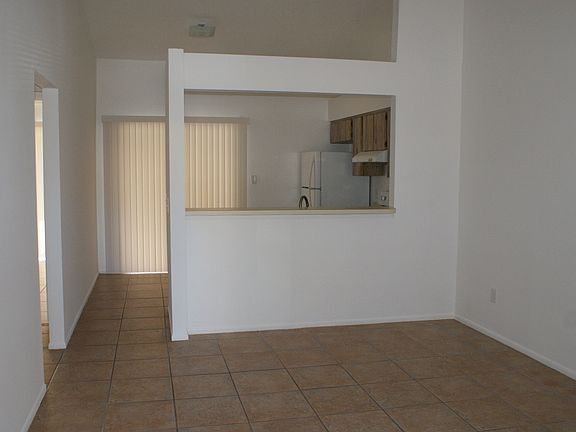 LIVING ROOM LOOKING INTO KITHEN