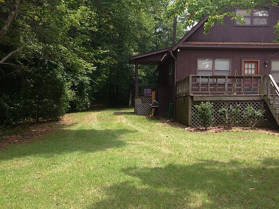 Shows covered side porch 