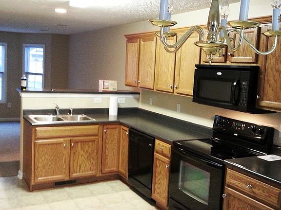 Kitchen. Note: the floor is newly installed with wood appearance.