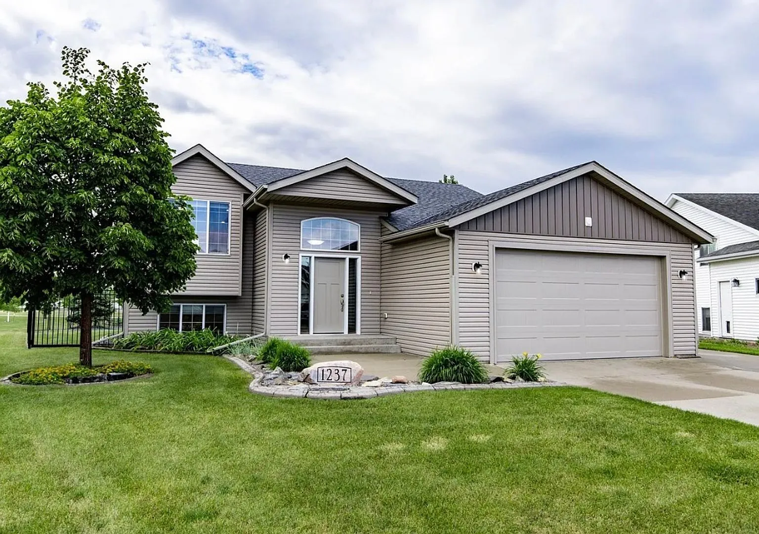 Spacious 4-Bedroom Home with a Huge Fenced Yard in West Fargo! — Photo 1