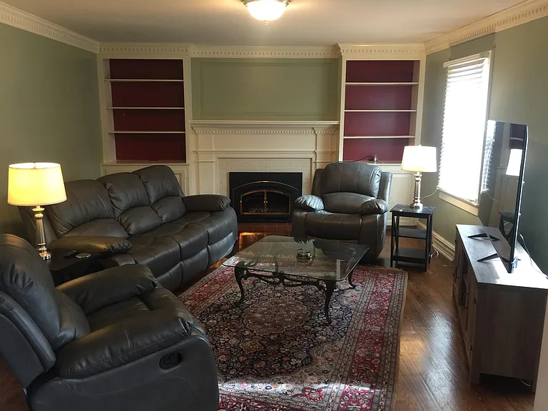 Family room with comfy sofa and reclining chairs!