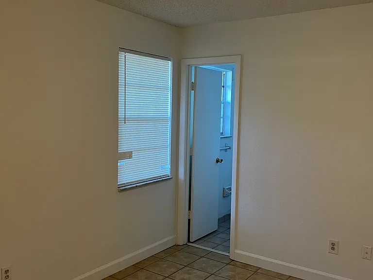 master bedroom with bathroom