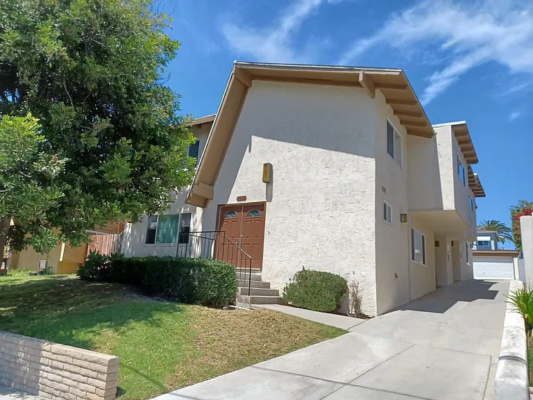 Picture of the 4-Unit Building. Unit #4 is located in the back unit; only one common wall with the other unit.