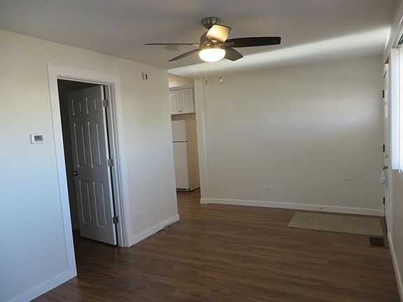 Living room opens to kitchen.