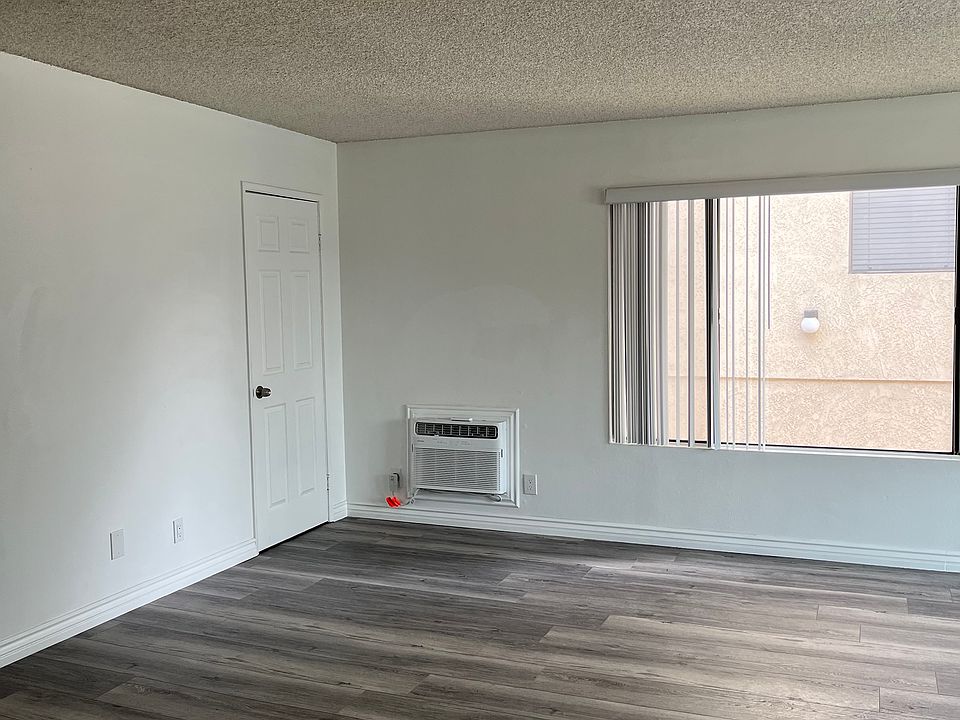 Partial living & coat closet door.