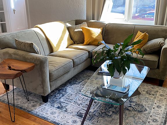 Living room with Arhaus couch and West Elm coffee table
