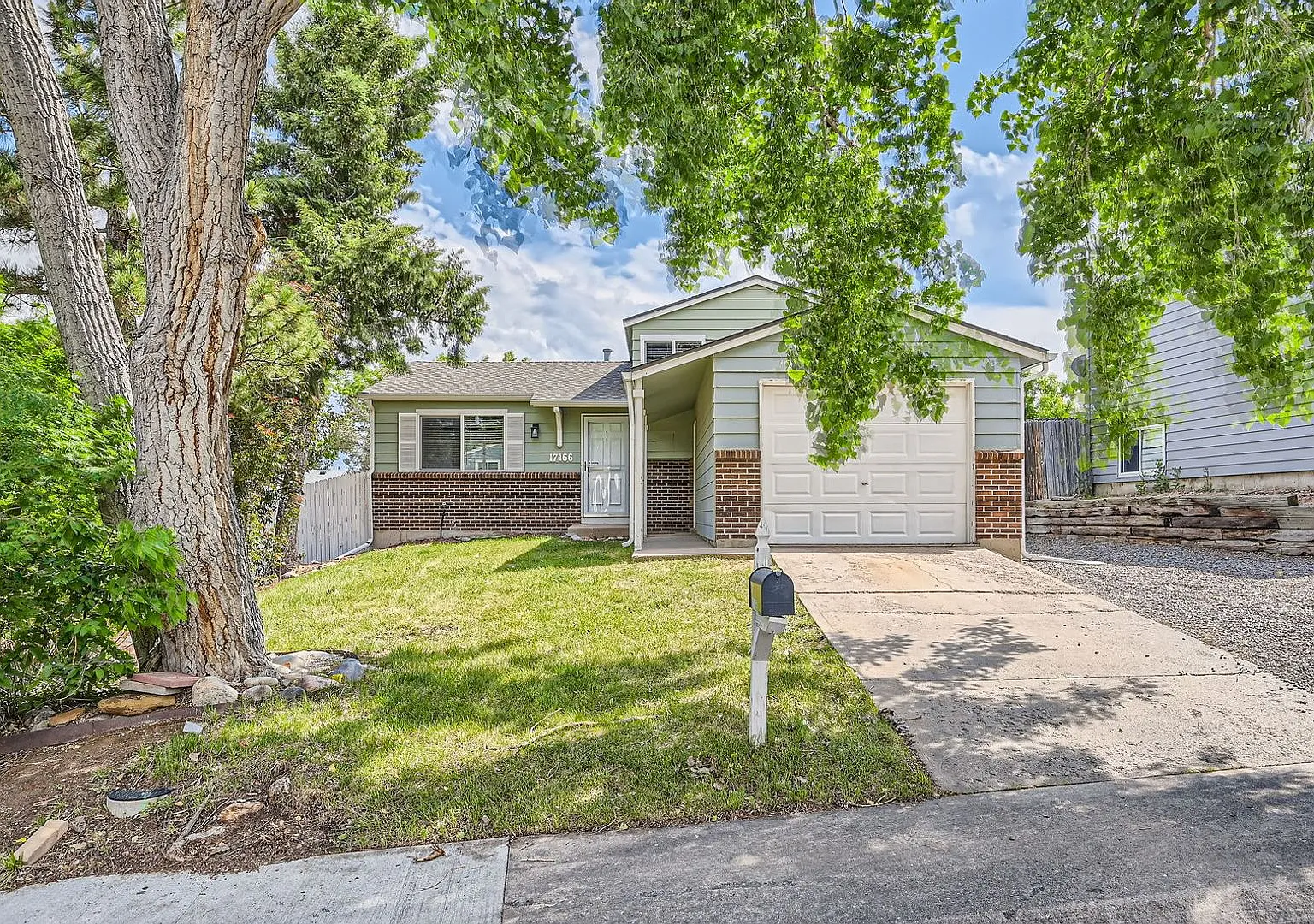 Spacious 3-Bedroom Aurora Home with Fenced Yard, Garage & Central AC — Photo 1