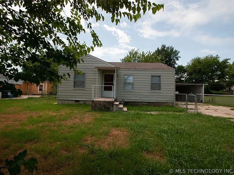 216 S 69th Ave E — Photo 1
