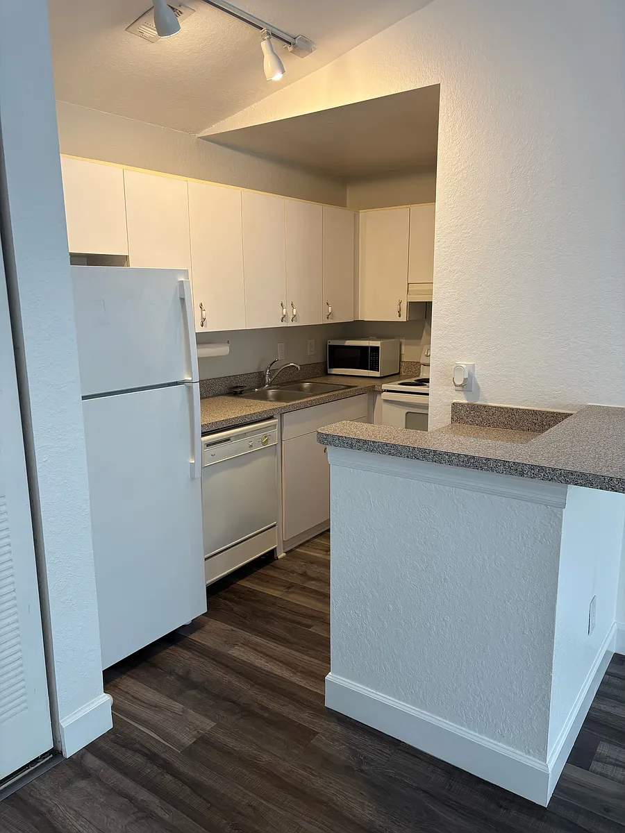 Building Photo - 6316 Raleigh St #415