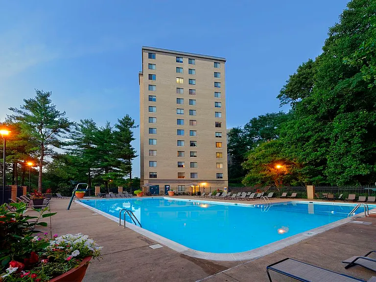 Swimming pool and sundeck with lounge seating