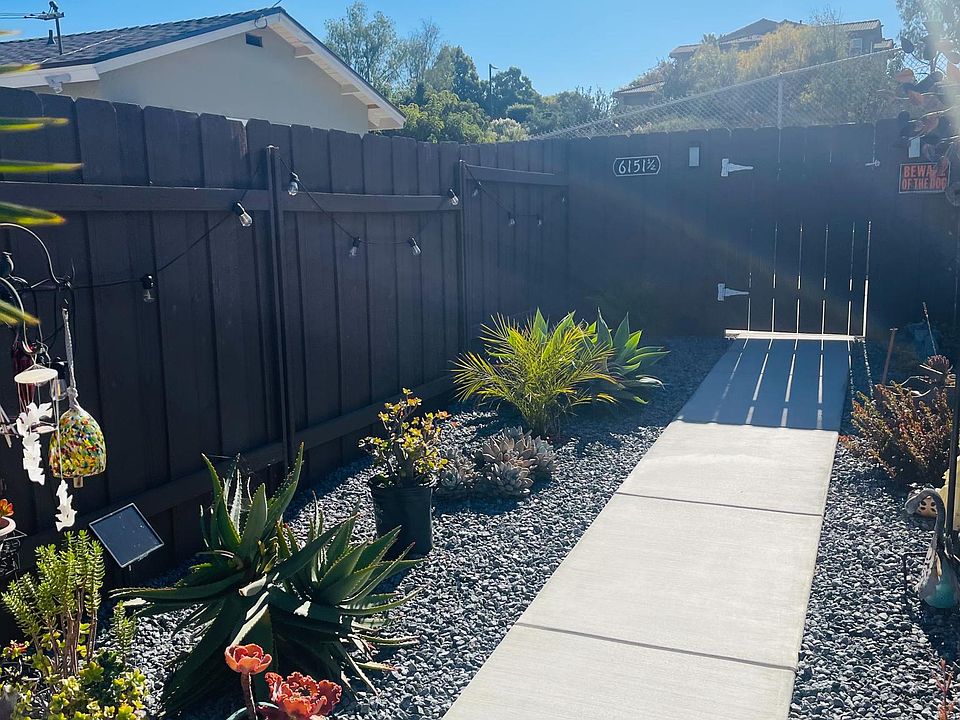 Walkway to private granny flat from Street, gate on the far end is actual entrance to granny flat patio area