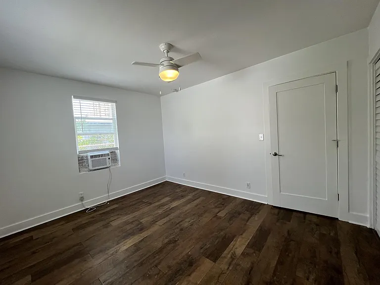 Bedroom, as viewed from the bathroom doorway