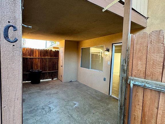 Private entrance with 1 of 2 private patios