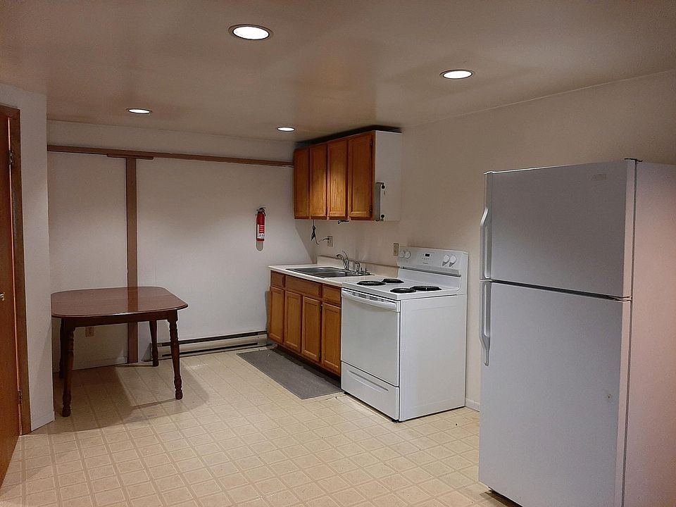Kitchen with new stove/oven.
