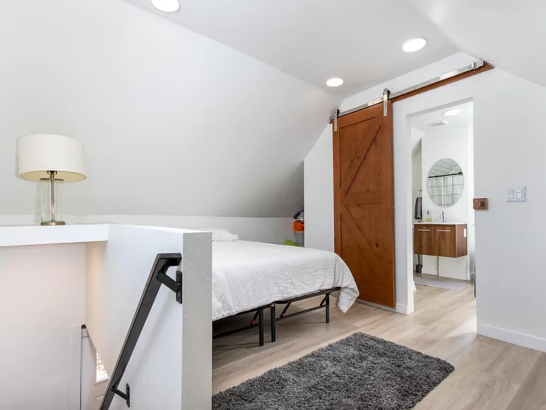 Upstairs. Bedroom and additional bathroom.