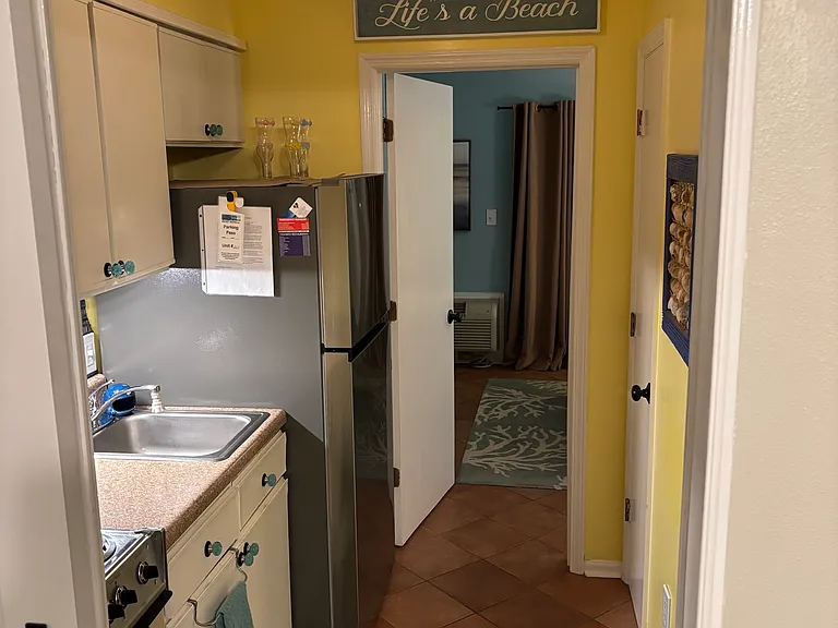 Fully equipped kitchen with pantry.