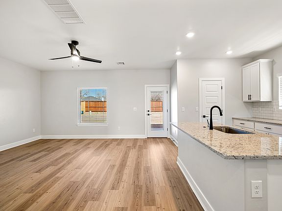 The family room is the perfect space for family and friends to relax.