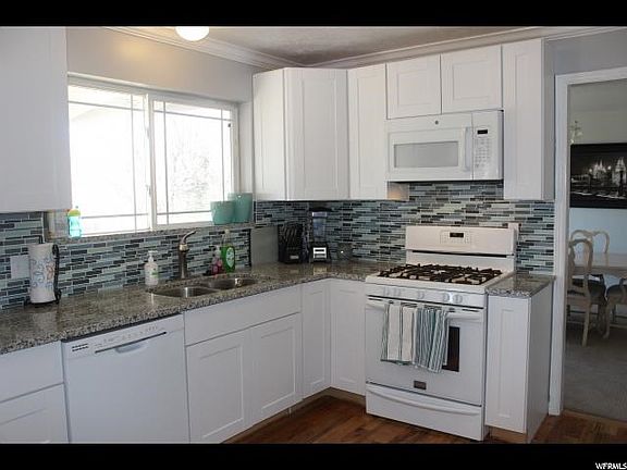 Gas range, microwave and dishwasher all included.  Fridge is negotiable.