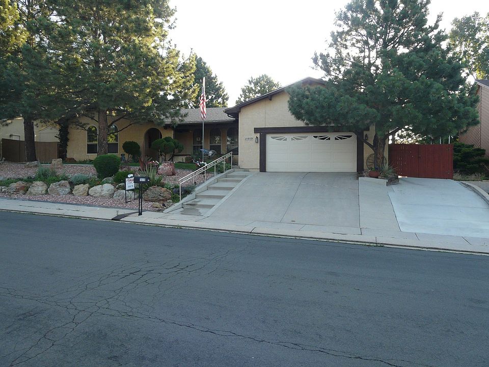 FRONT WITH 2 DRIVEWAYS