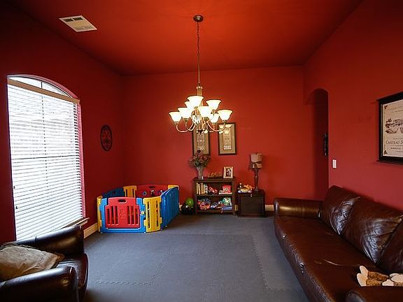 13x12 This is the formal dinning being used currently as the play area