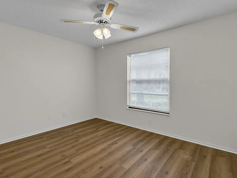 Entering Guest Bedroom w/ walk-in closet