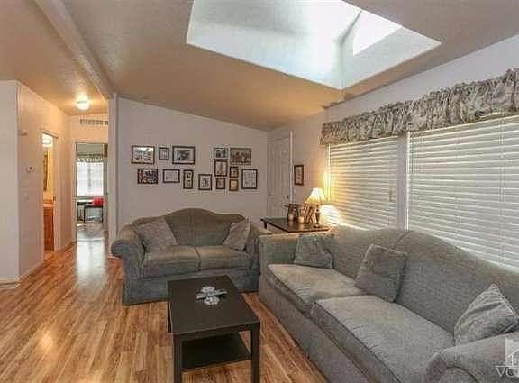 Open floor plan is comfortable and cozy.