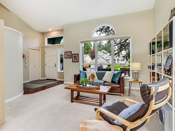 A glimpse of the unique curved staircase off the formal living room