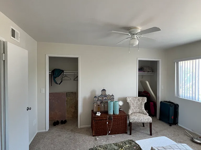 Master bedroom, 2 closets with doors open