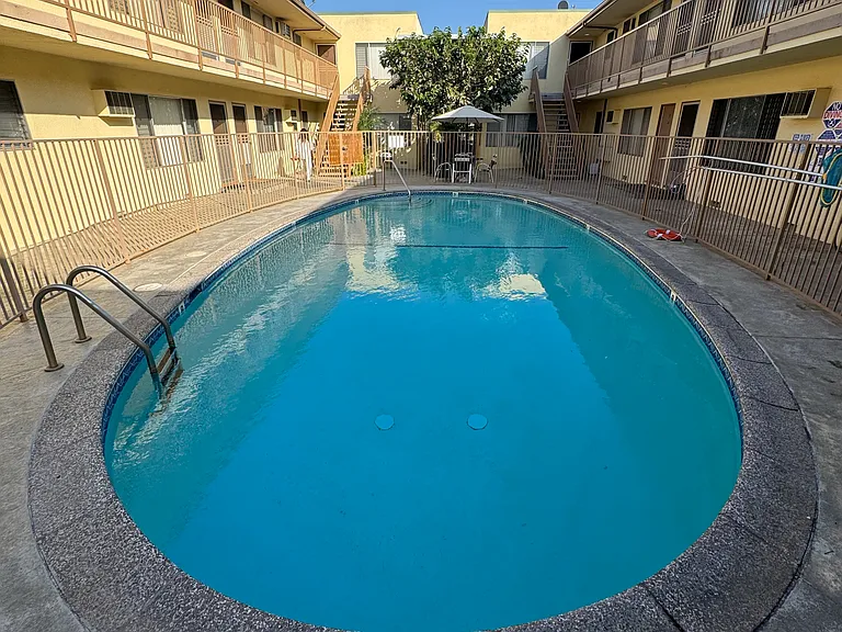 Complex includes newly refurbished pool and outdoor patio areas