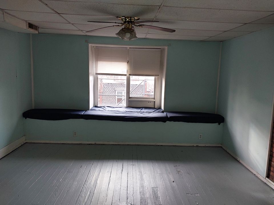 View of the bedroom from the kitchen.