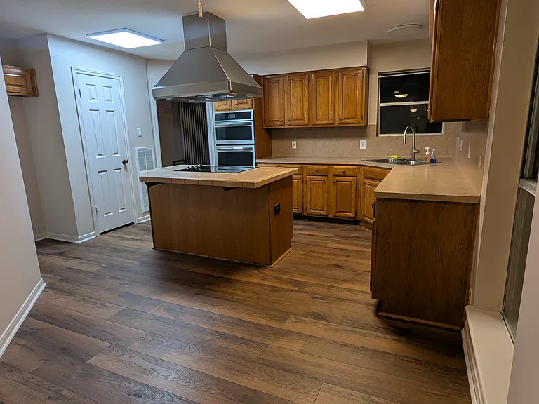 This gourmet kitchen is utterly perfect for the cook who loves to impress and entertain. All cooking appliances are brand new, top-of-the-line pieces --ready for your best creations or everyday convenient meals. A table in the breakfast nook could seat 6.
