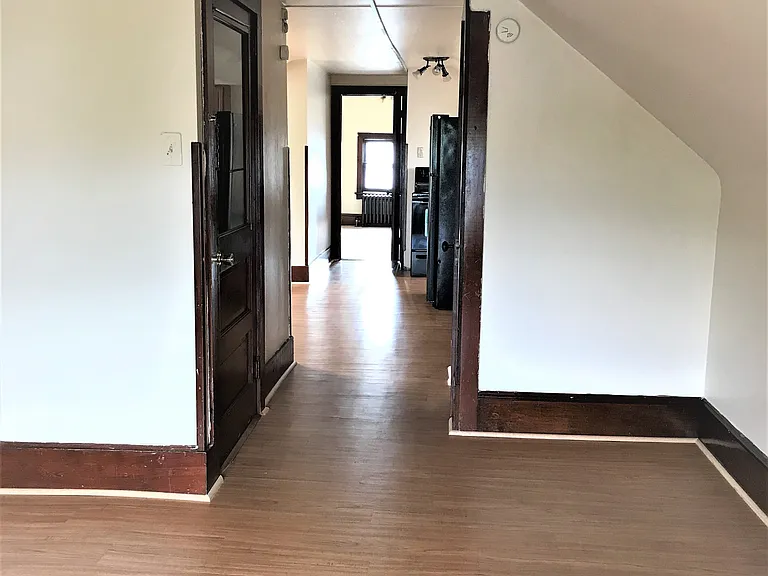 Living Room through Dining/Kitchen to Bedroom