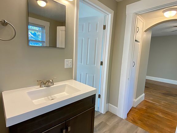 Full bath connecting to master bedroom and kitchen.