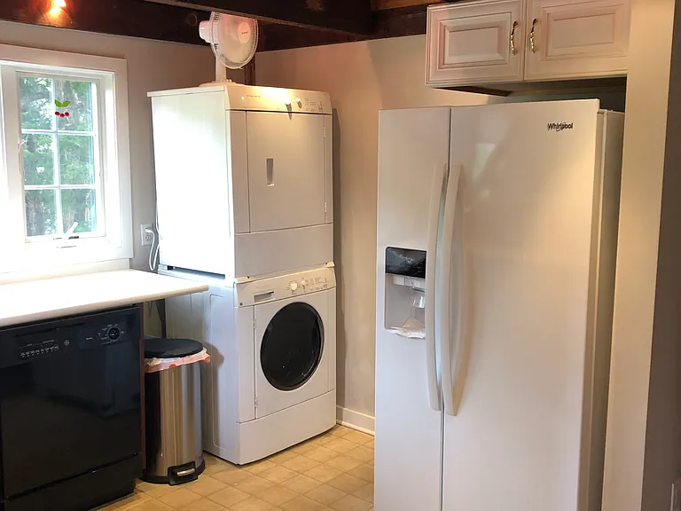 Full-size new side by side refrigerator, kitchen
Washer and dryer