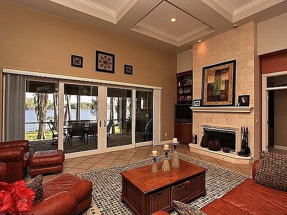 Spectacular Water Views from your Family Room with 16' Coffered Ceilings