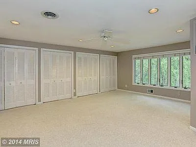 Master Bedroom - Closets (two door on left are walk-in) and Windows looking out to backyard