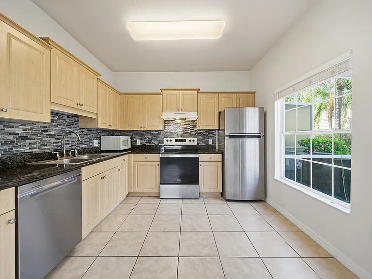 7780 Plantation Cir — Photo 20