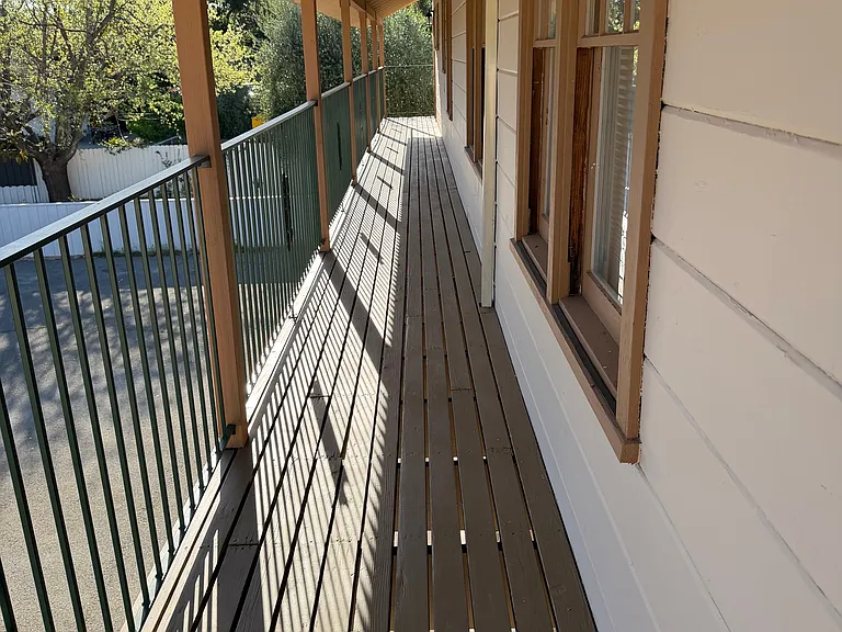 Balcony along the entire width of apartment. It's not needed for transit so put chairs, plants, etc