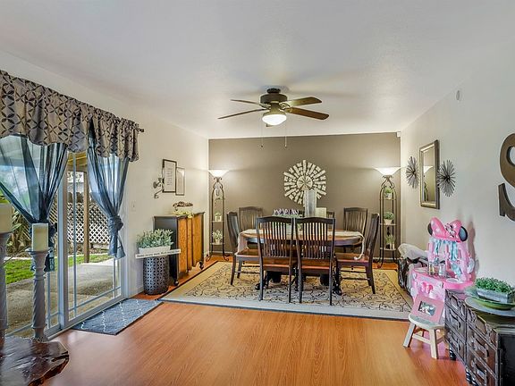 Separate family room area that is used for dining area currently. Slider door leads out to covered back patio.