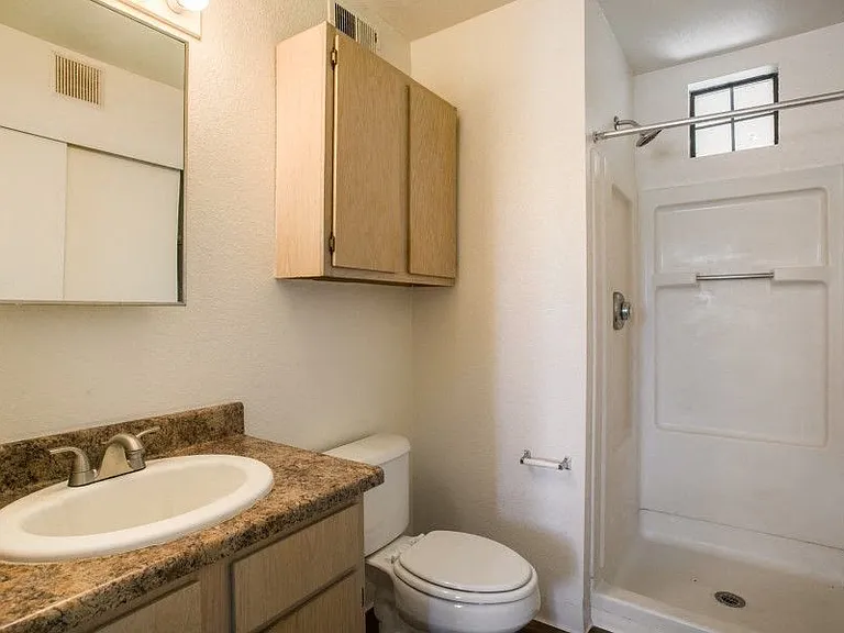 Bathroom with extra storage and a walk in shower